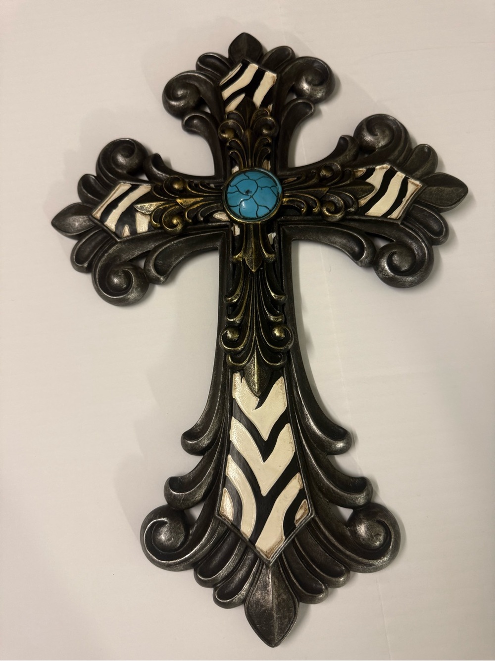 Cross with zebra pattern and turquoise accent. 10x15